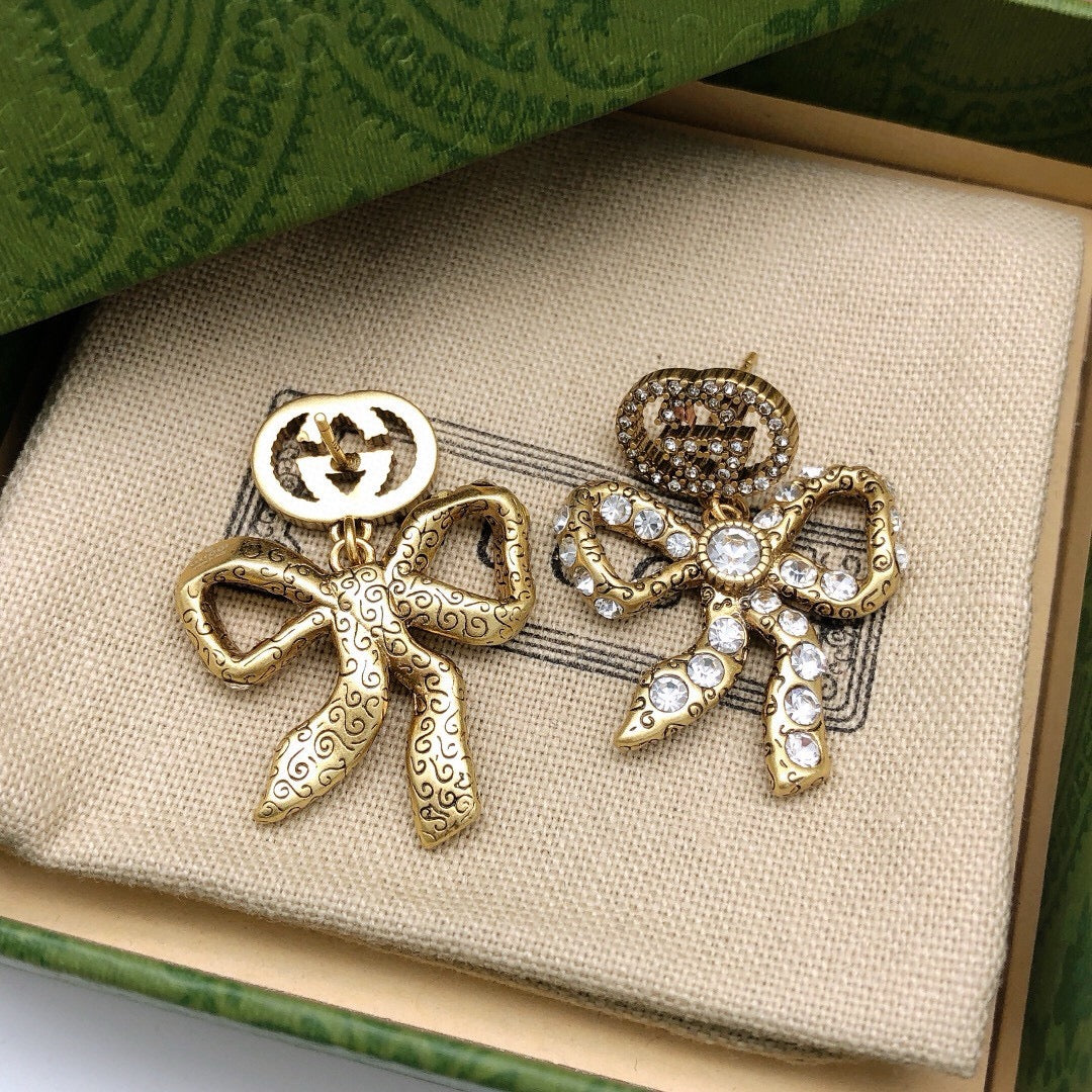Double-G Emblem Statement Earrings in Polished Metal-Tone – Design 001 detail view
