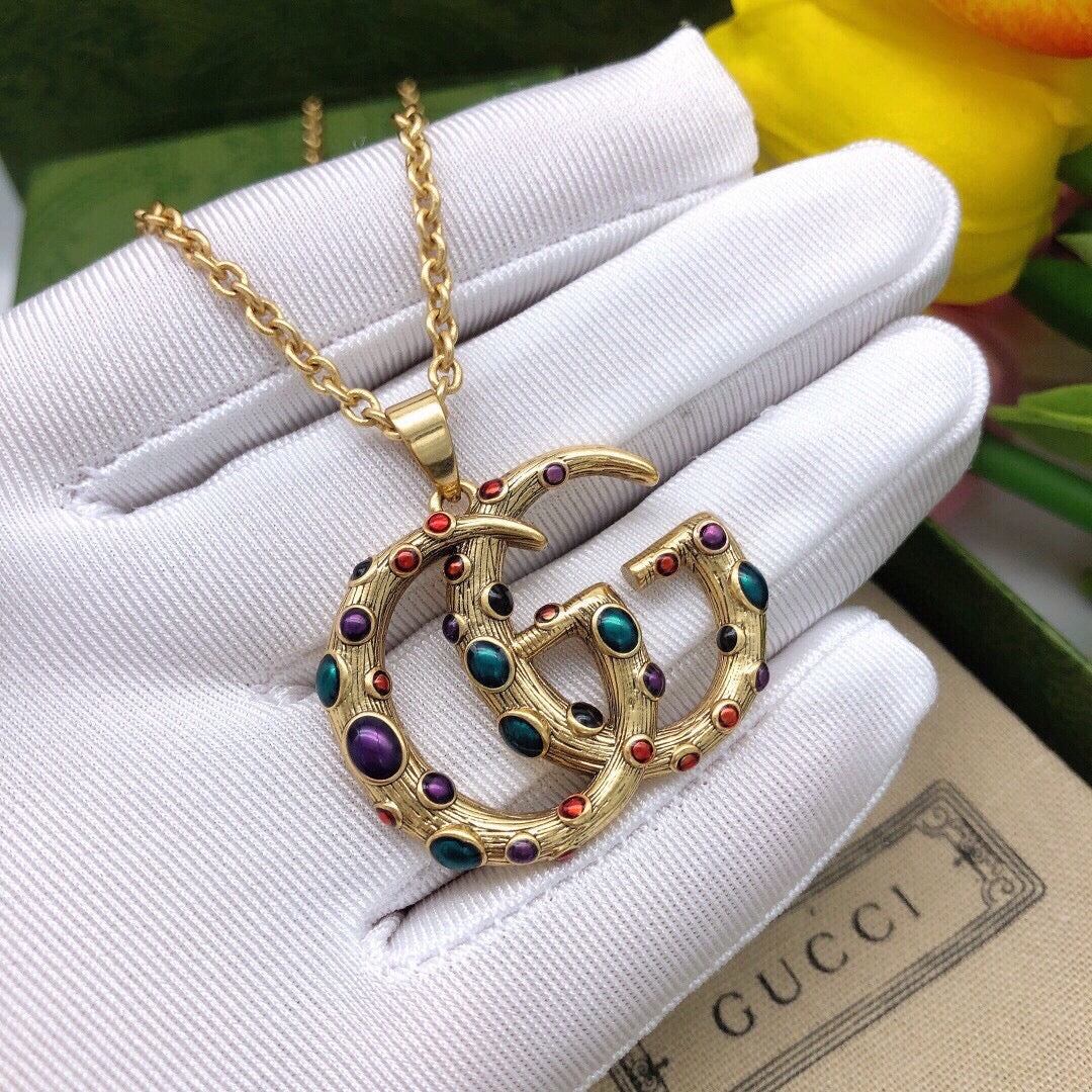 Double-G Emblem Pendant Necklace in Polished Metal-Tone – Vintage Detail – Design 008 close-up detail