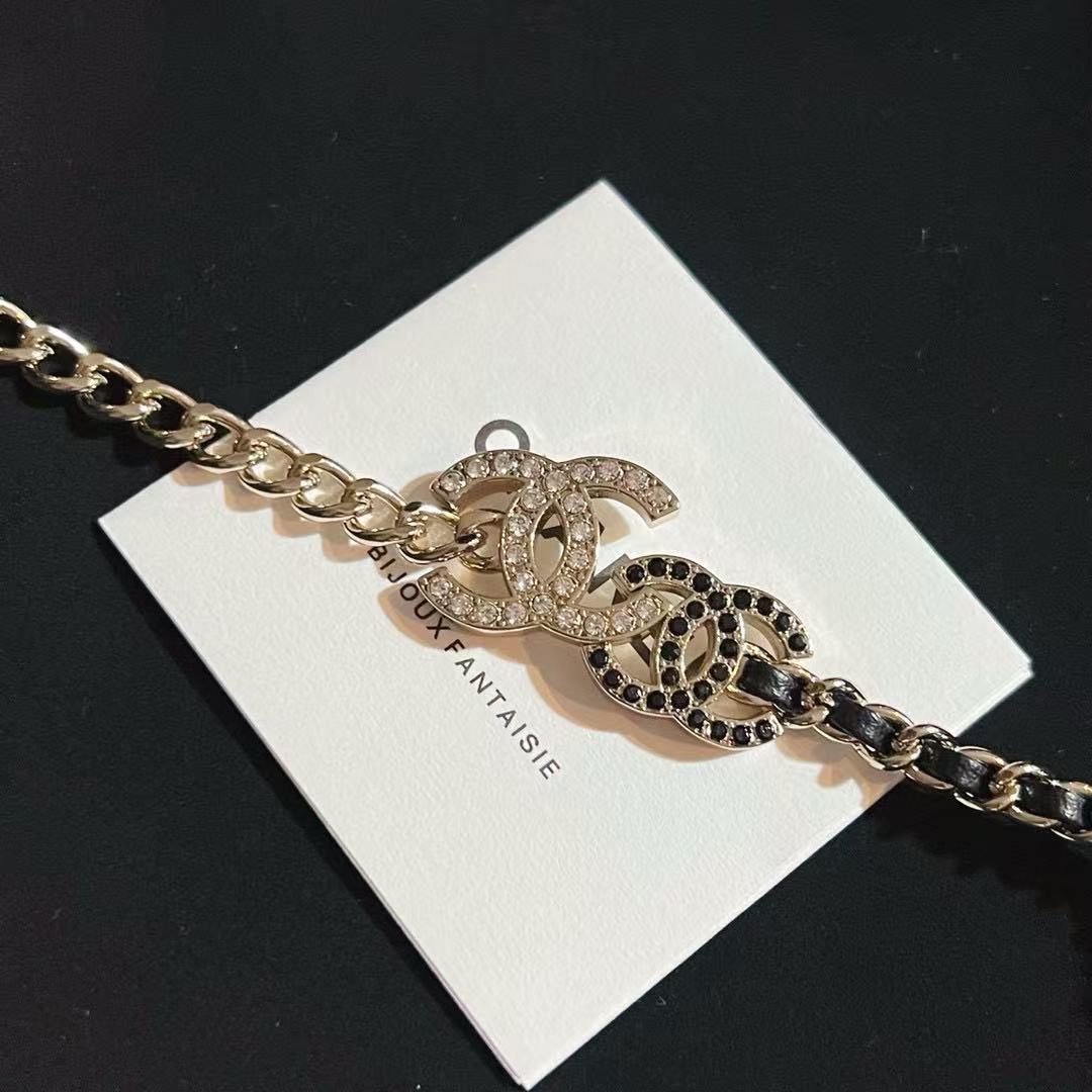 Signature Emblem Pendant Necklace in Gold-Tone – Black Detail main product view