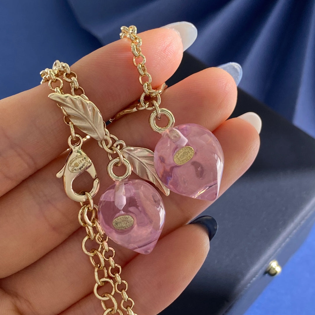 Double-C Emblem Crystal-Accent Pendant Necklace – Pink Detail – Design 003 detail view