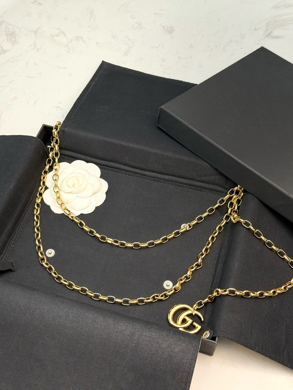 Double-G Emblem Jewelry Accessory in Polished Metal-Tone – Design 003 detail view