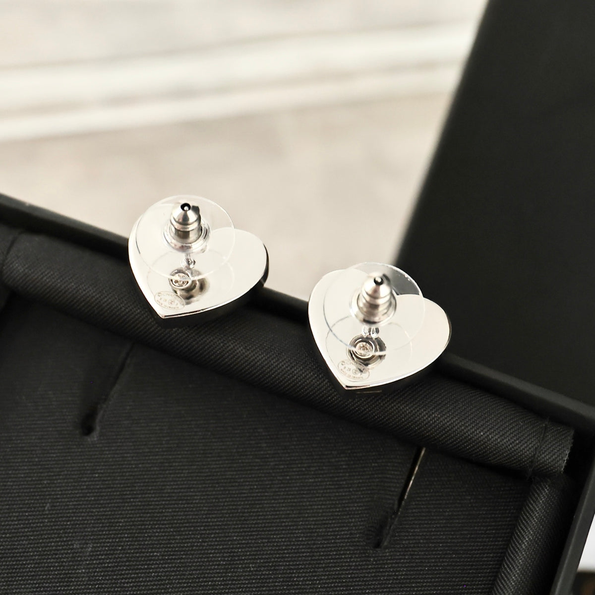 Double-C Emblem Crystal-Accent Stud Earrings – Heart Detail – Design 005 detail view