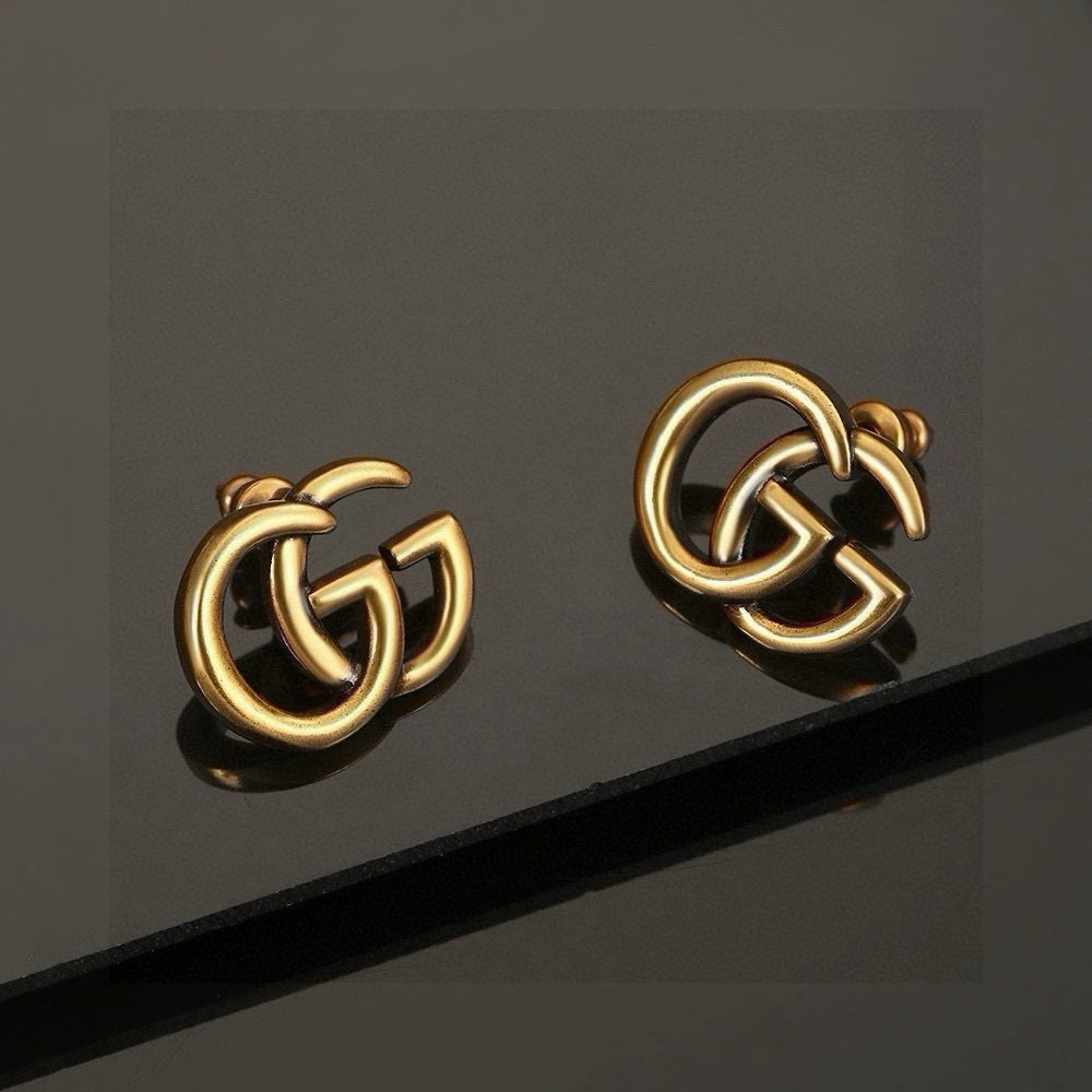 Geometric Emblem Stud Earrings in Polished Metal-Tone – Design 008 detail view
