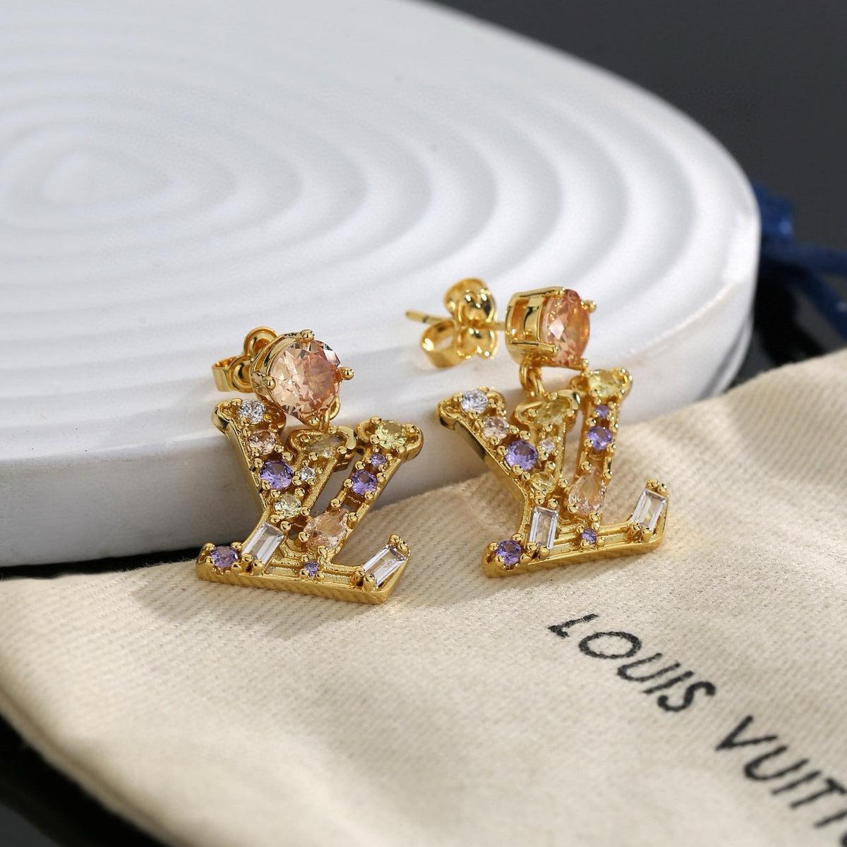 Letter Emblem Stud Earrings in Polished Metal-Tone – Design 032 close-up detail