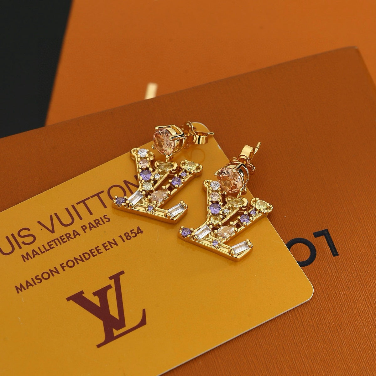 Letter Emblem Stud Earrings in Polished Metal-Tone – Design 032 front product view