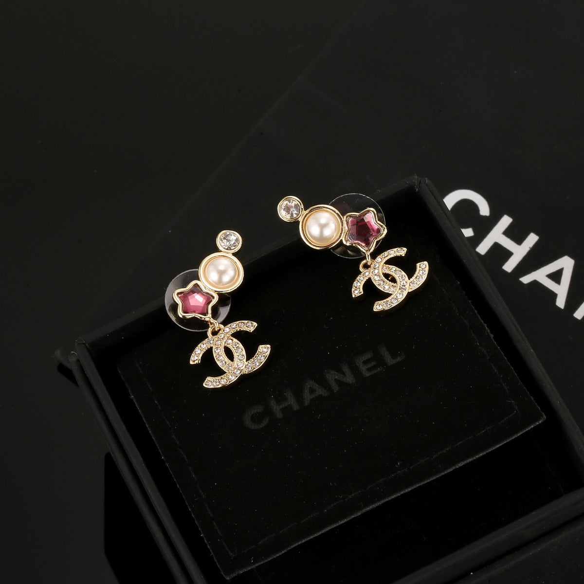Double-C Emblem Stud Earrings in Gold-Tone – Star Detail – Design 003 main product view