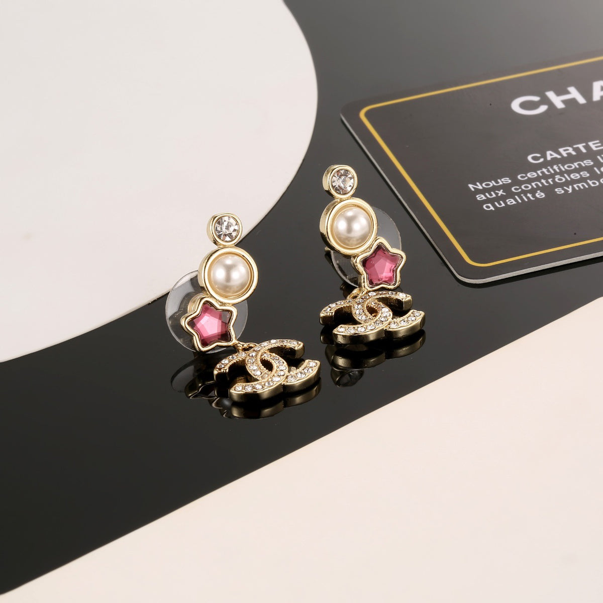 Double-C Emblem Stud Earrings in Gold-Tone – Star Detail – Design 003 front product view