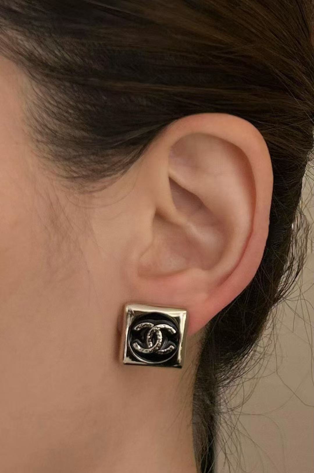 Double-C Emblem Stud Earrings in Polished Metal-Tone – Design 351 front product view