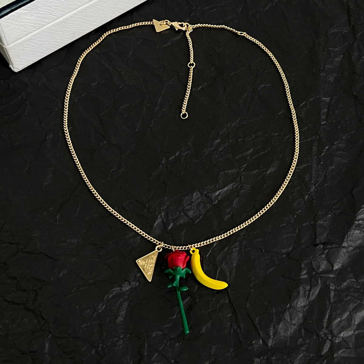 Signature Emblem Pendant Necklace in Polished Metal-Tone – Design 01 close-up view