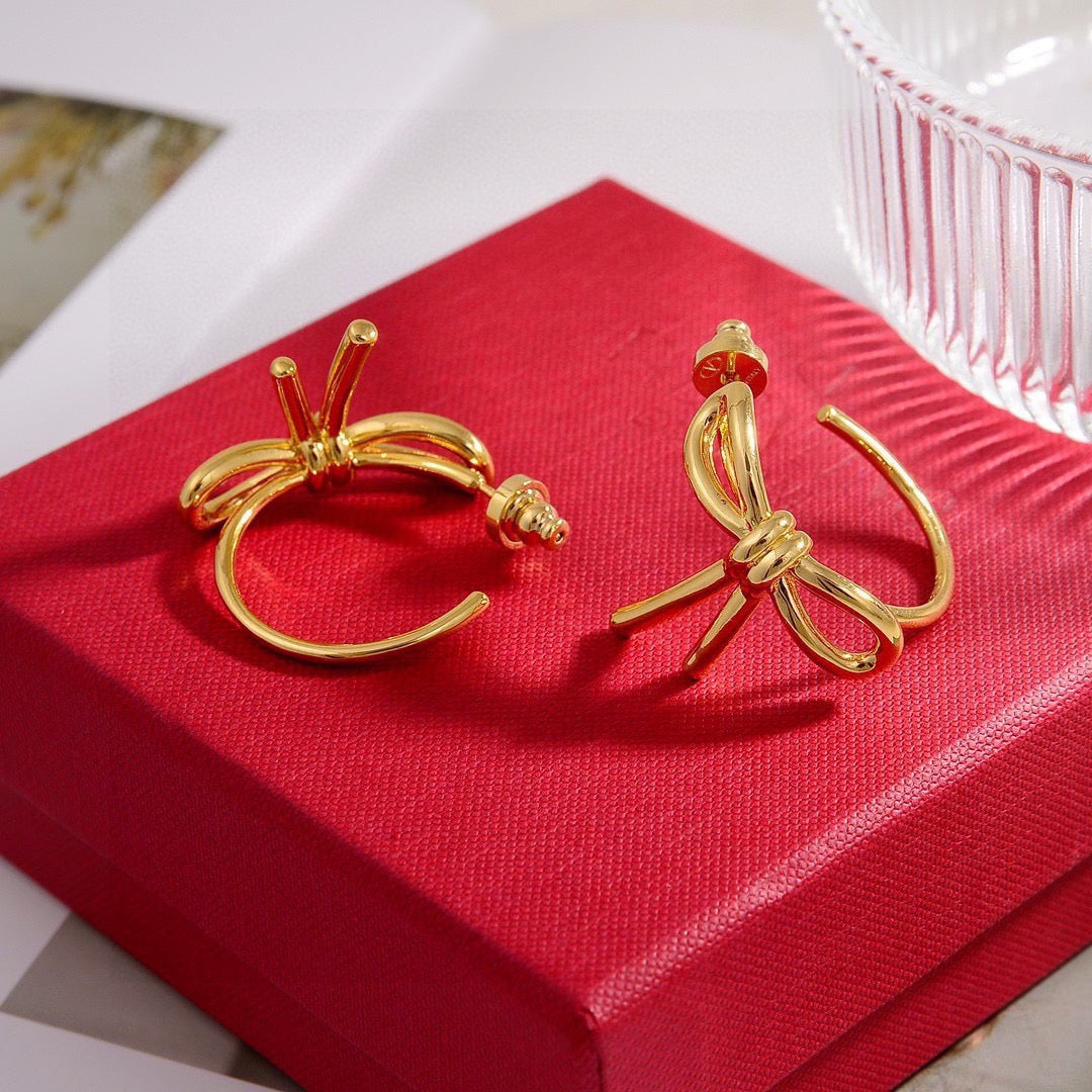 Bow Stud Earrings in Polished Metal-Tone – Design 02 detail view