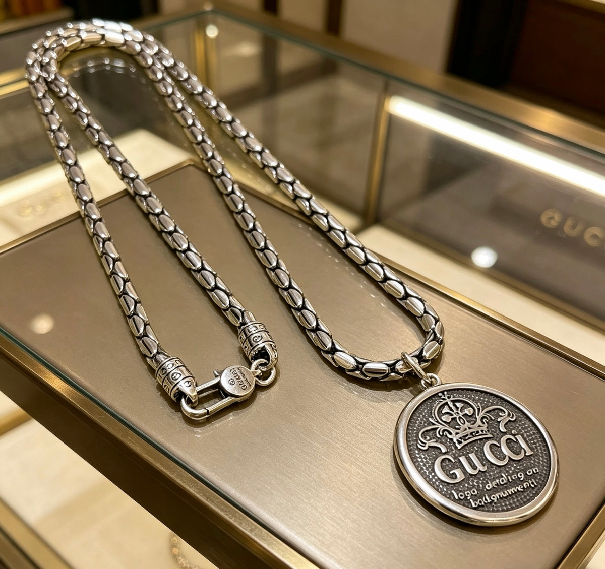 Double-G Emblem Pendant Necklace in Polished Metal-Tone – Design 062 side detail
