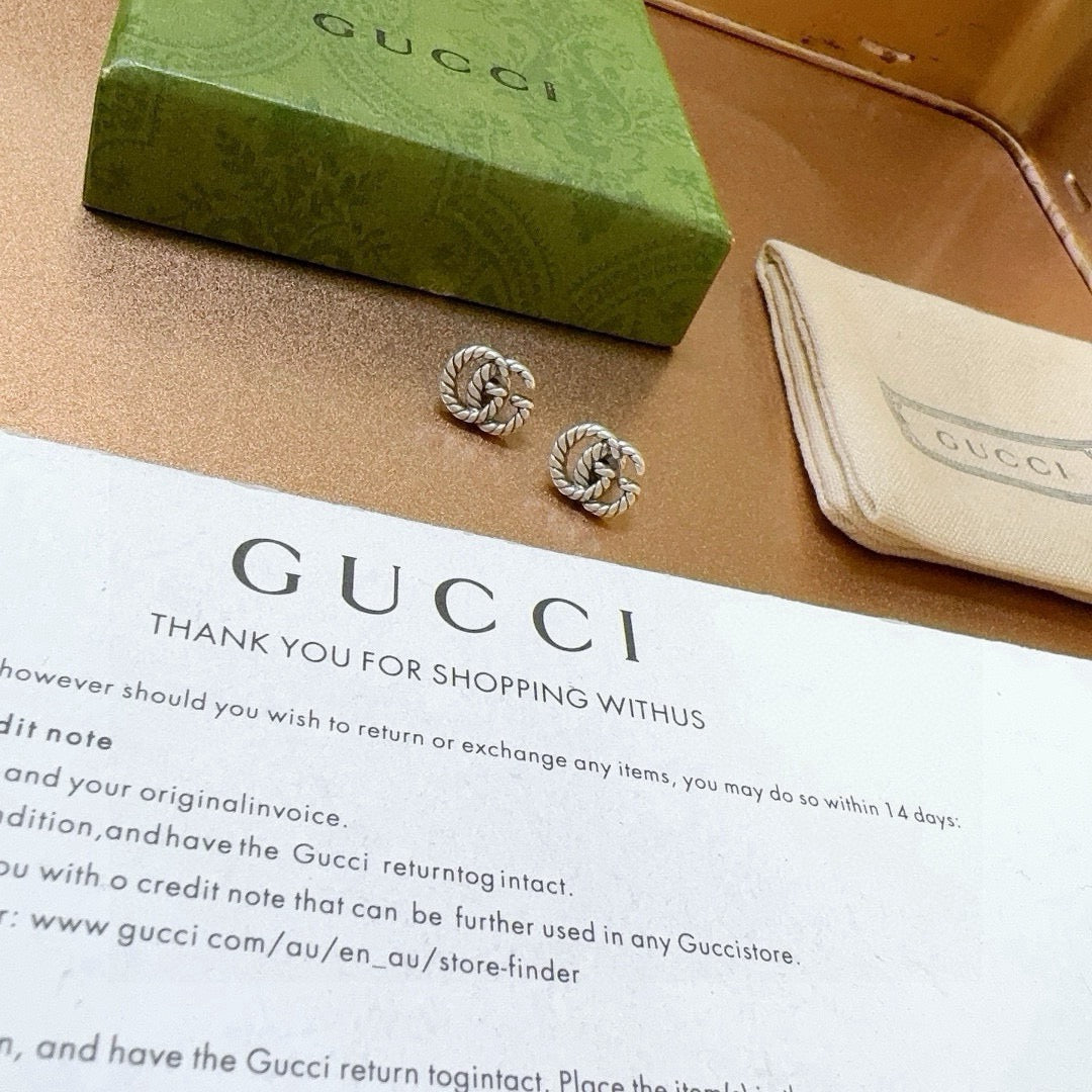 Double-G Emblem Stud Earrings in Polished Metal-Tone – Vintage Detail – Design 009 close-up detail