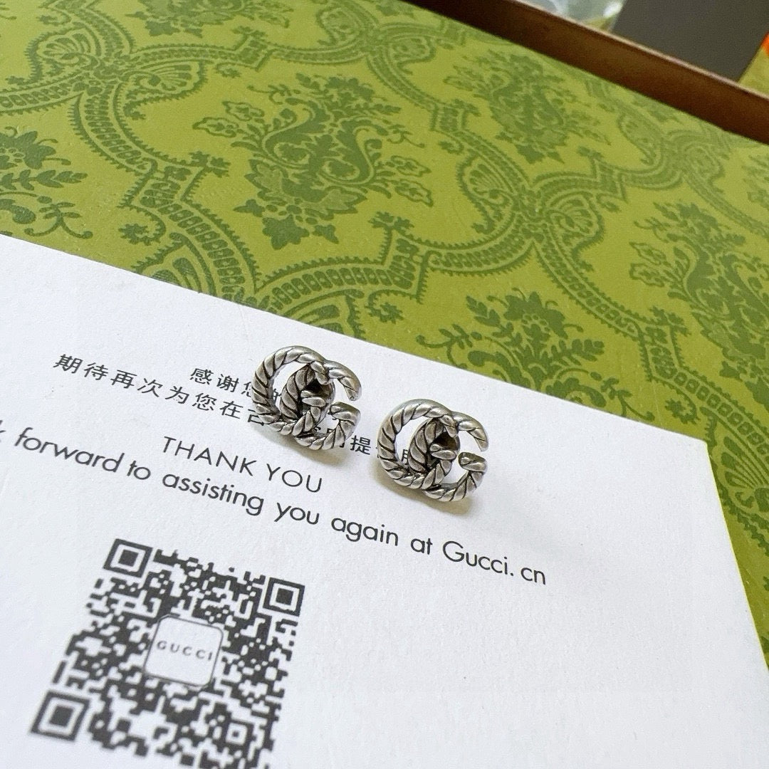 Double-G Emblem Stud Earrings in Polished Metal-Tone – Vintage Detail – Design 009 styled product view