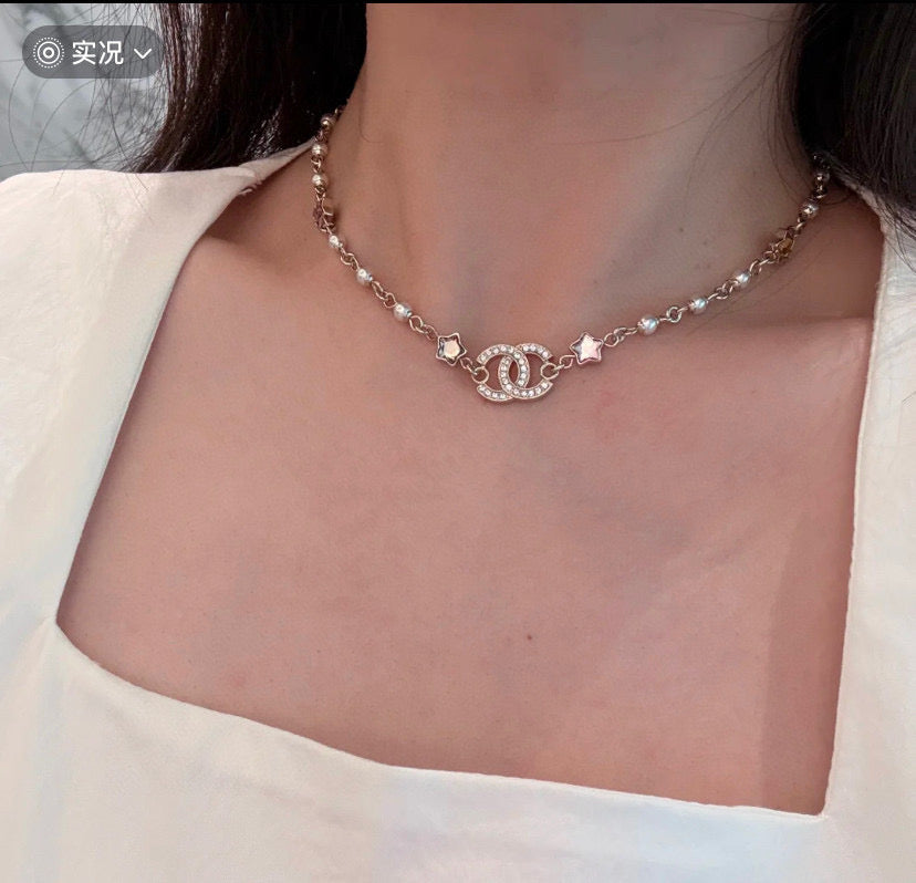 Double-C Emblem Pearl-Detail Pendant Necklace – Pearl Detail – Design 038 close-up detail