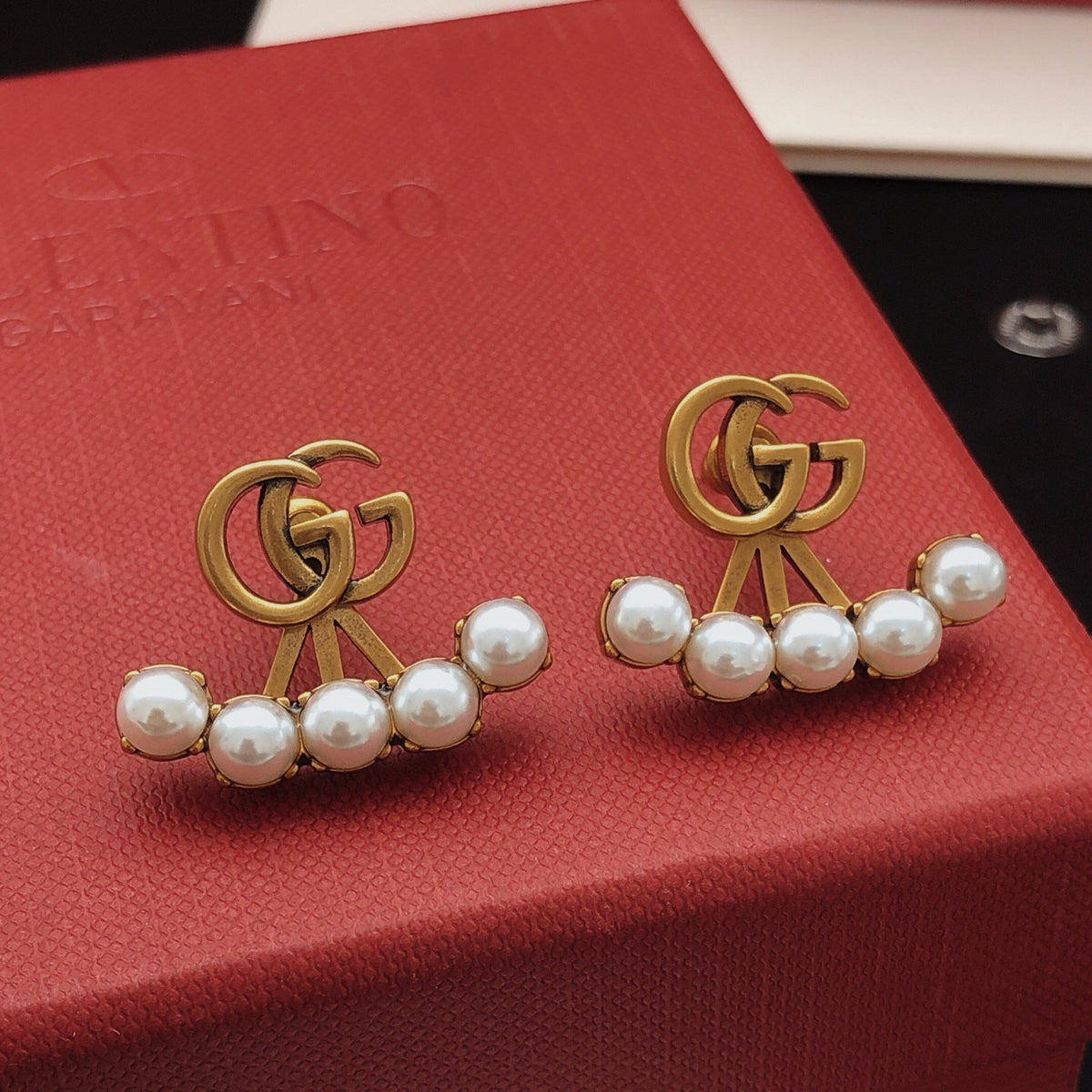 Geometric Emblem Stud Earrings in Gold-Tone – Design 002 styled product view