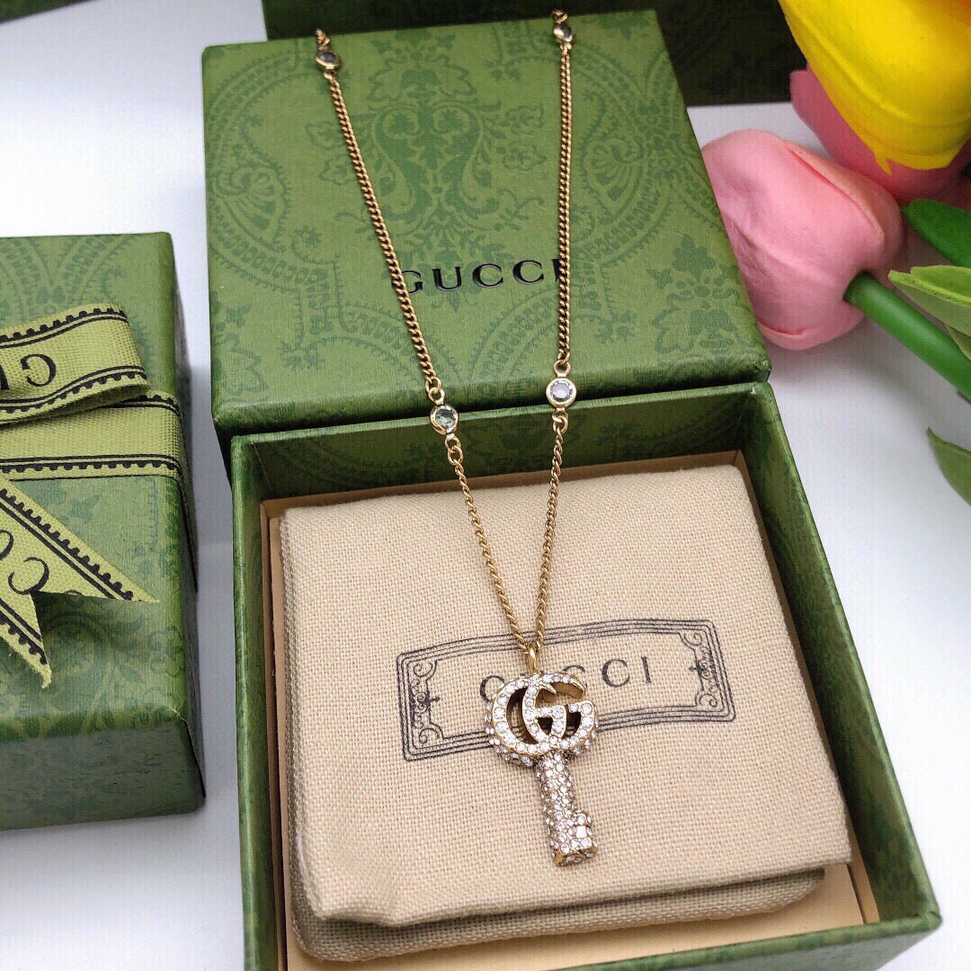 Double-G Emblem Pendant Necklace in Polished Metal-Tone – Crystal Detail – Design 002 side detail