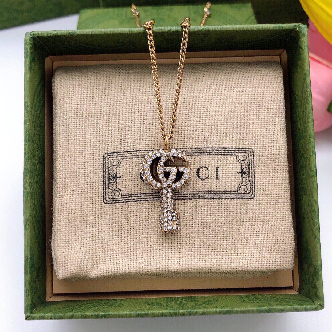 Double-G Emblem Pendant Necklace in Polished Metal-Tone – Crystal Detail – Design 002 detail view