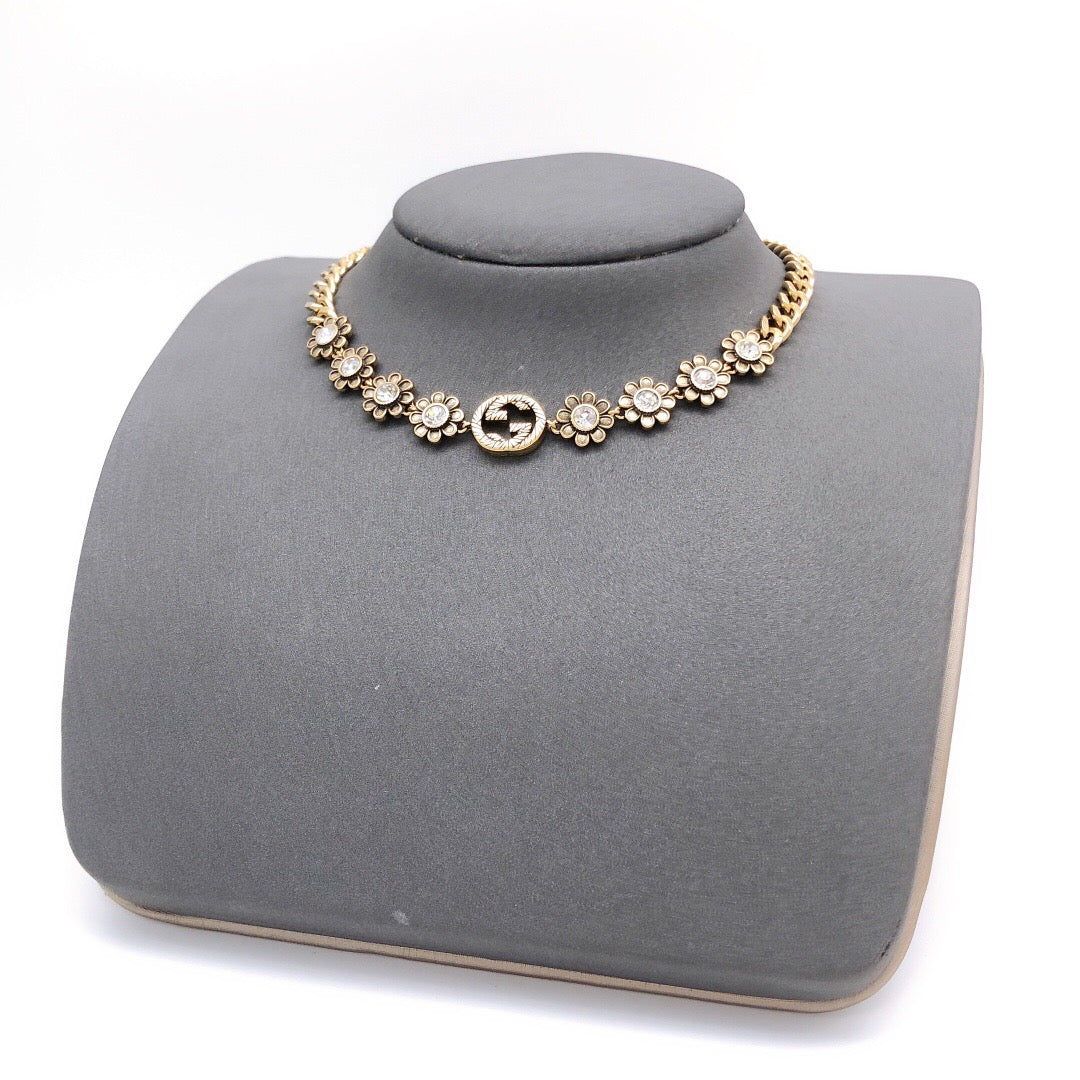 Double-G Emblem Pendant Necklace in Polished Metal-Tone – Design 089 close-up detail