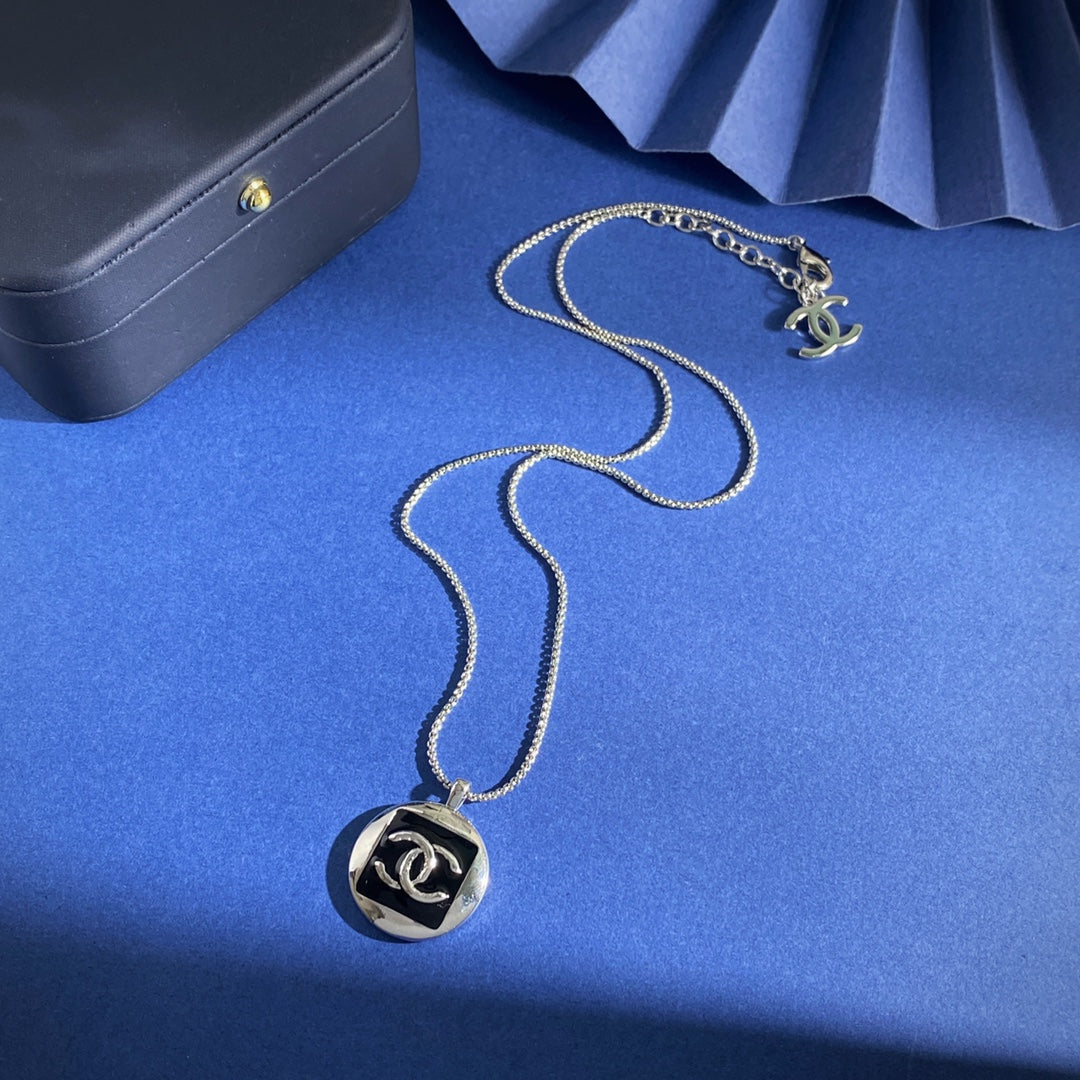 Double-C Emblem Pendant Necklace in Gold-Tone – Black Detail – Design 002 front product view