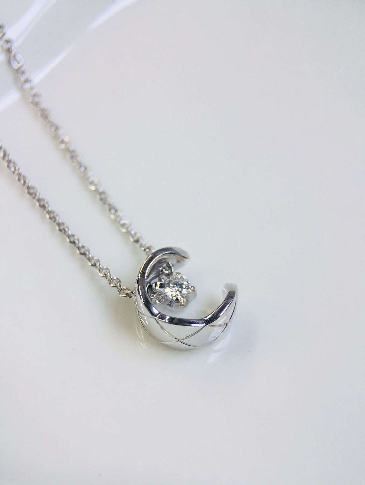 Signature Emblem Pendant Necklace in Silver-Tone – White Detail styled product view