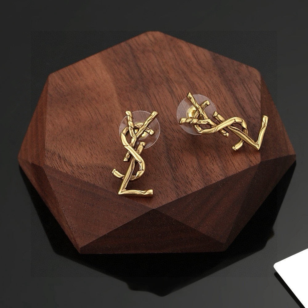 Geometric Emblem Stud Earrings in Gold-Tone – Design 002 close-up detail