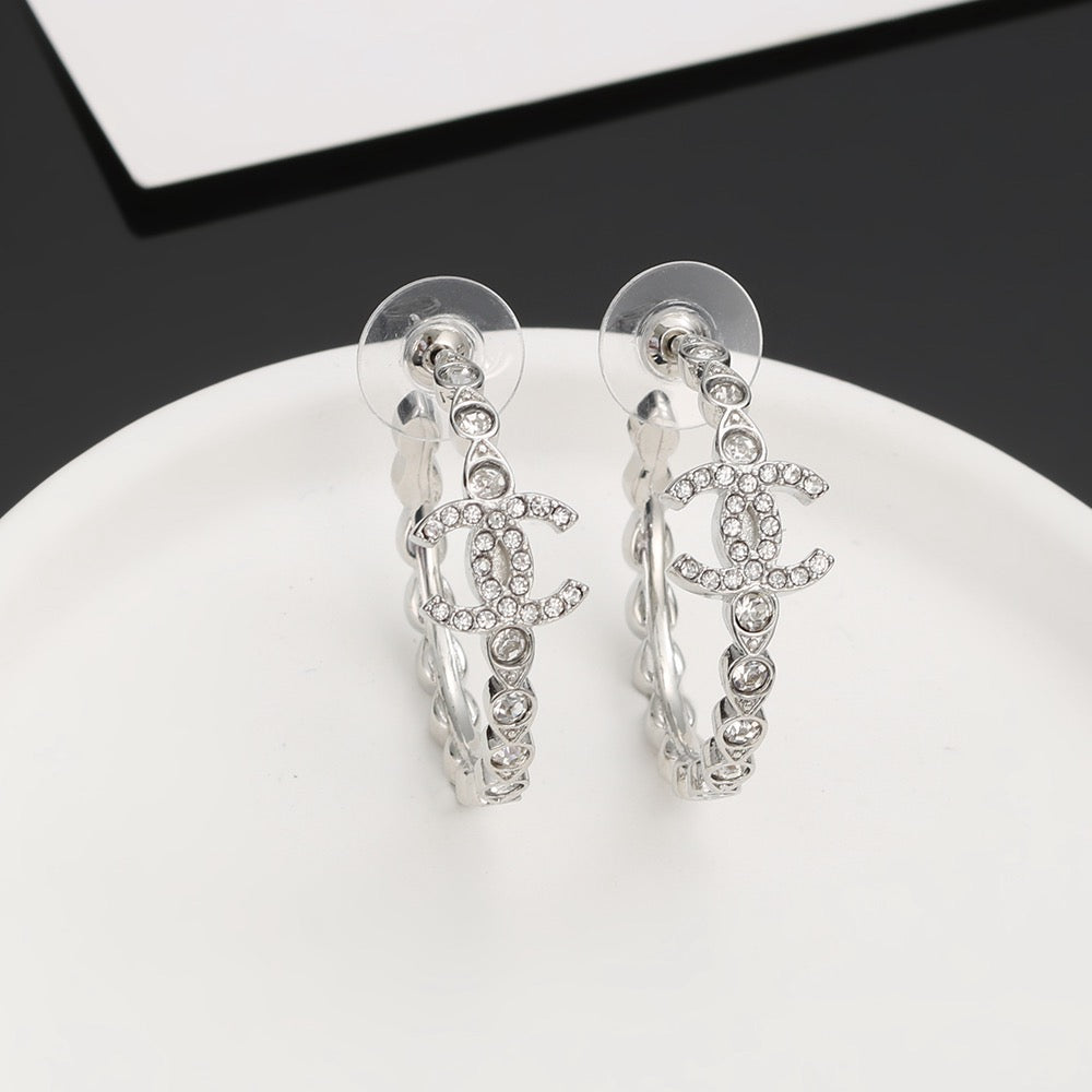 Signature Emblem Crystal-Accent Stud Earrings – Red Detail – Design 003 close-up detail