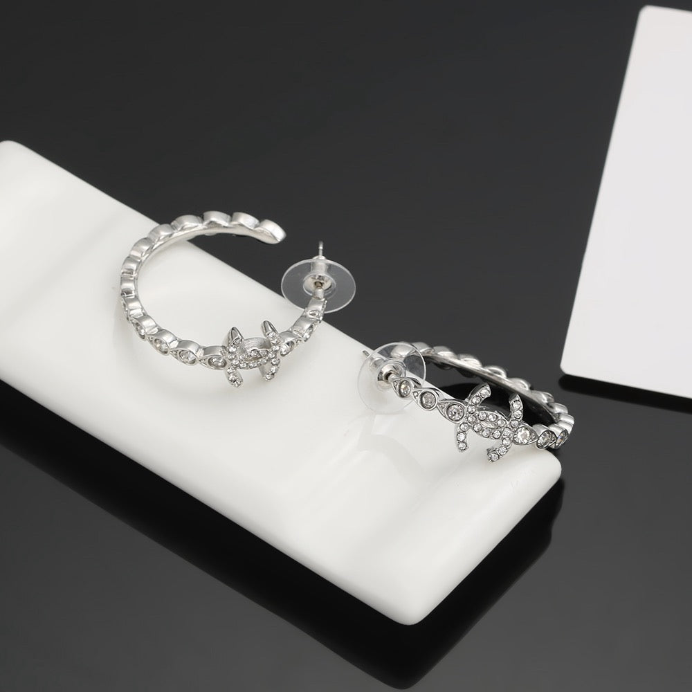Signature Emblem Crystal-Accent Stud Earrings – Red Detail – Design 003 detail view