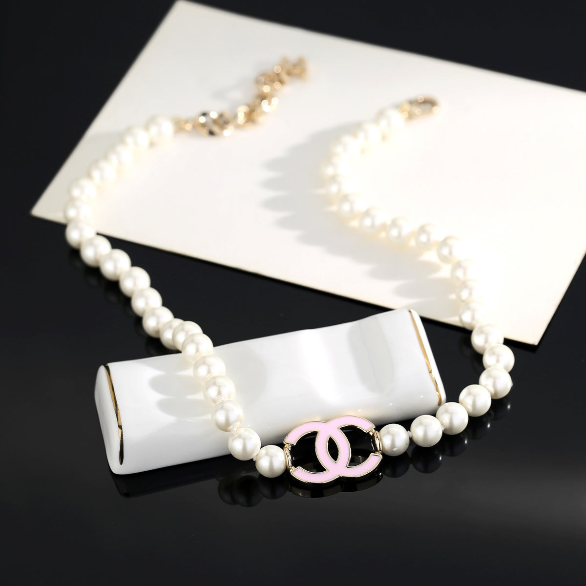 Double-C Emblem Pearl-Detail Pendant Necklace – Pearl Detail – Design 102 close-up detail