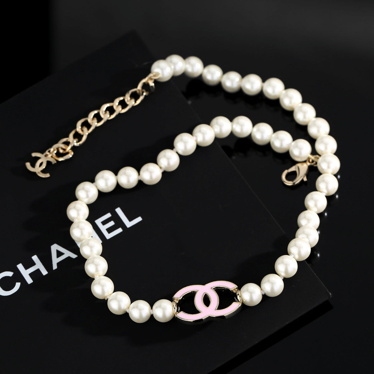Double-C Emblem Pearl-Detail Pendant Necklace – Pearl Detail – Design 102 detail view