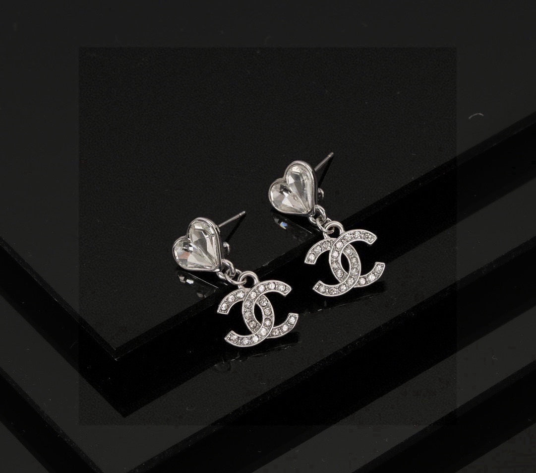 Double-C Emblem Stud Earrings in Polished Metal-Tone – Design 176 close-up detail