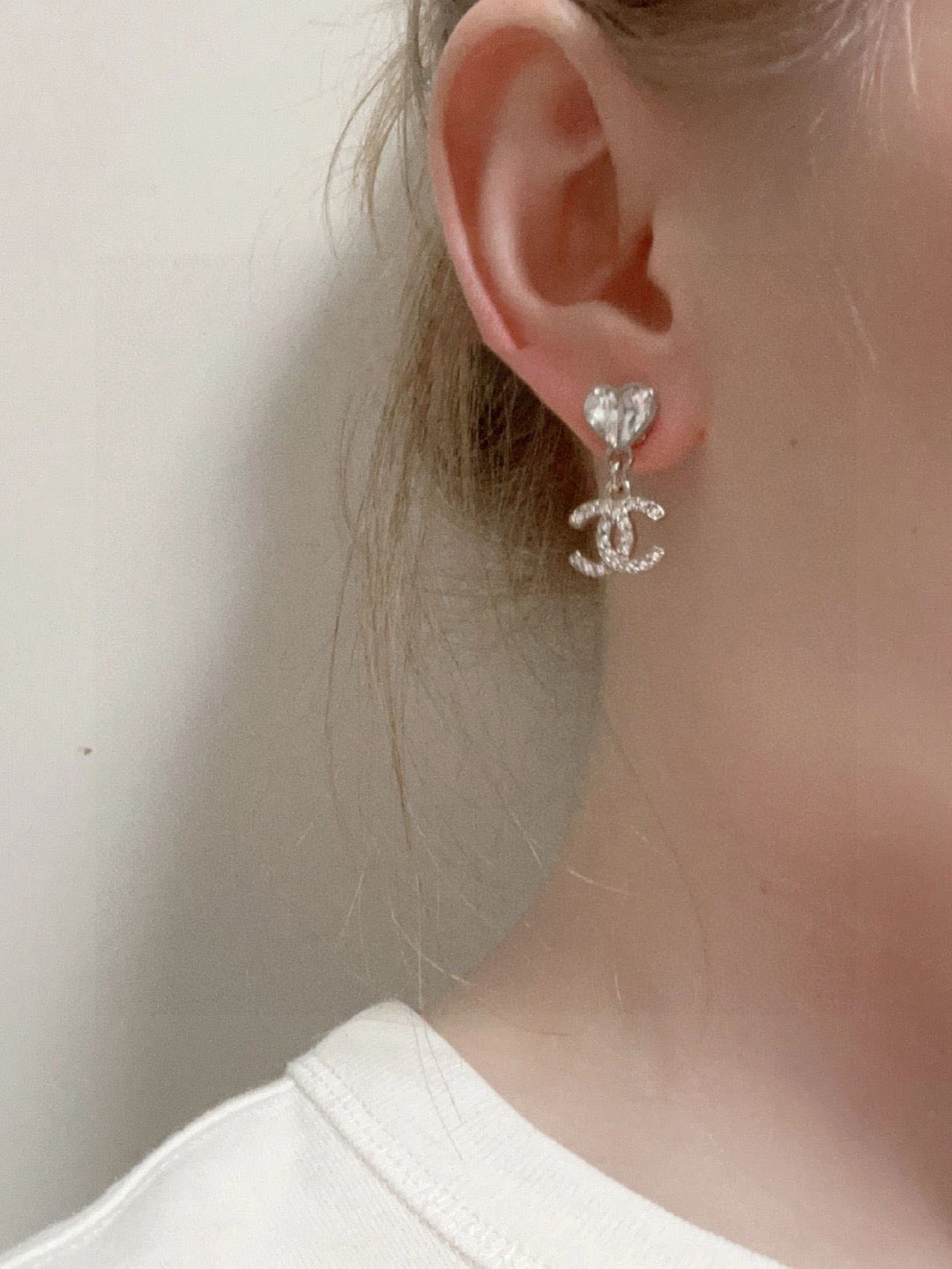 Double-C Emblem Stud Earrings in Polished Metal-Tone – Design 176 front product view