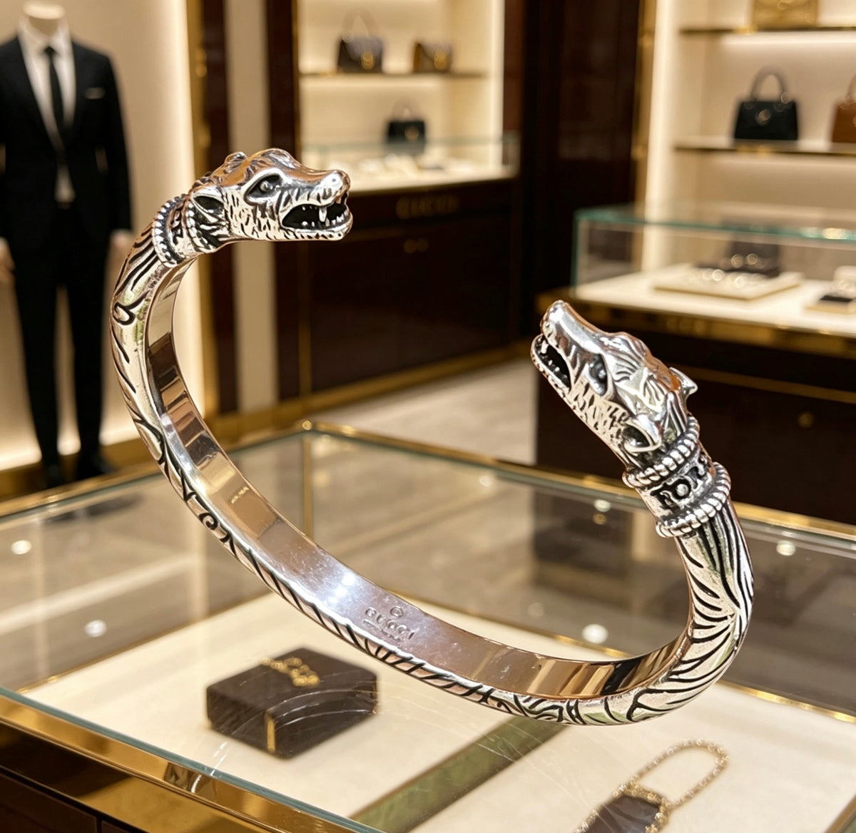 Double-G Emblem Bangle in Polished Metal-Tone – Design 030 detail view
