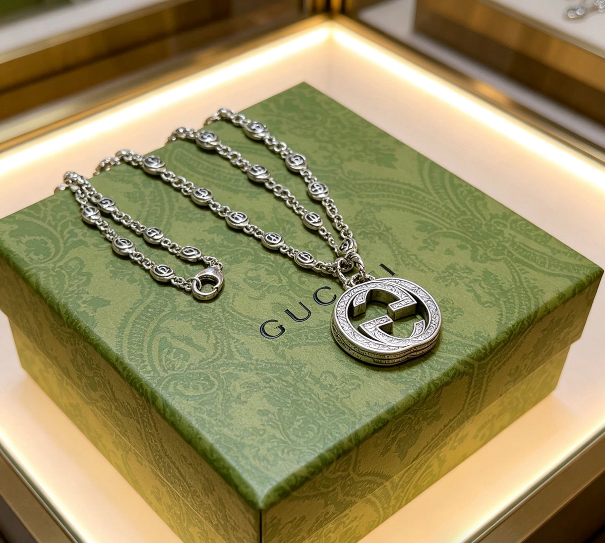Double-G Emblem Pendant Necklace in Polished Metal-Tone – Design 087 close-up detail