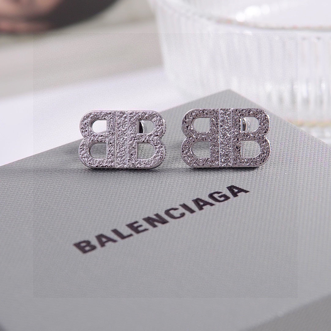 Geometric Emblem Stud Earrings in Gold-Tone – Design 010 detail view