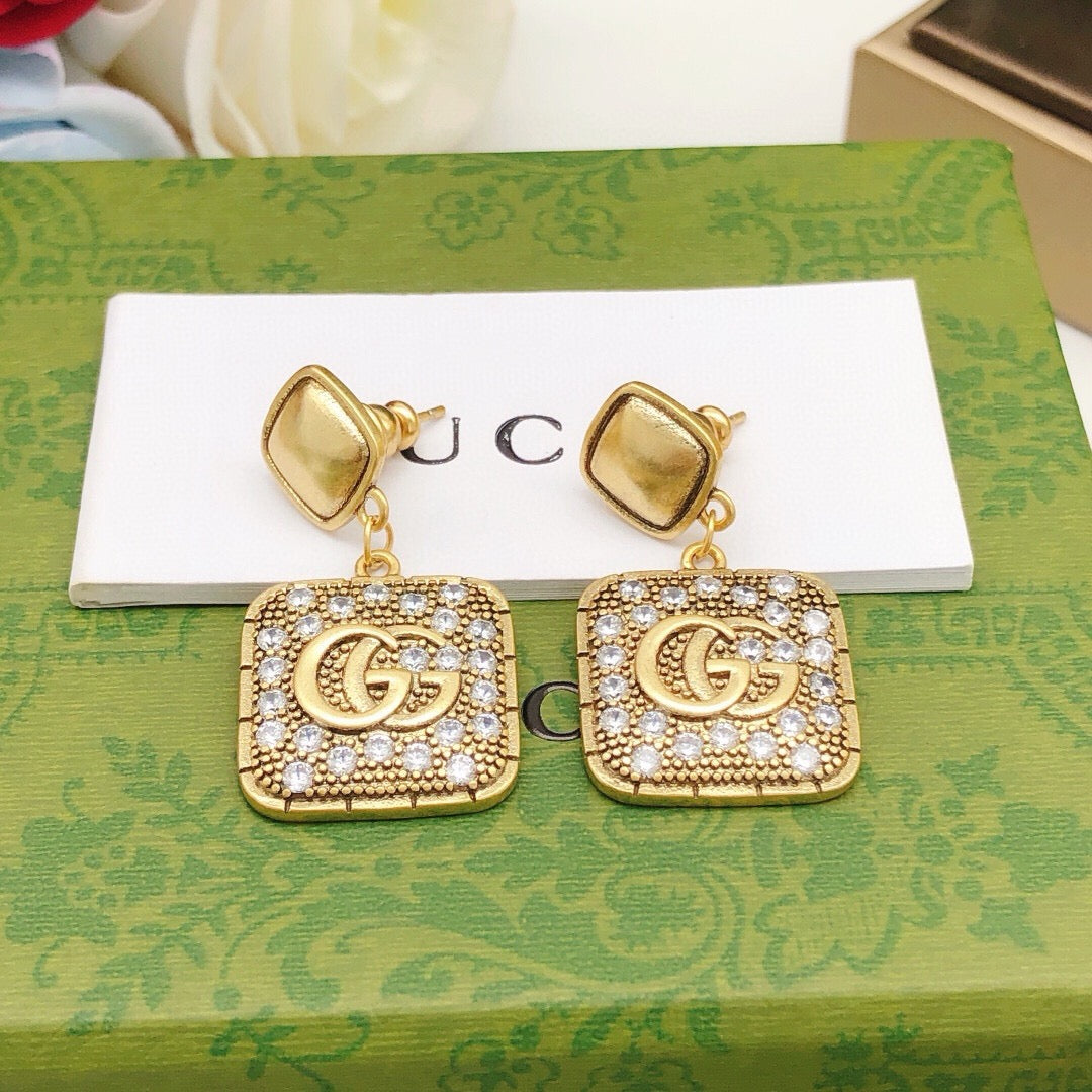 Geometric Emblem Stud Earrings in Polished Metal-Tone – Design 026 styled product view