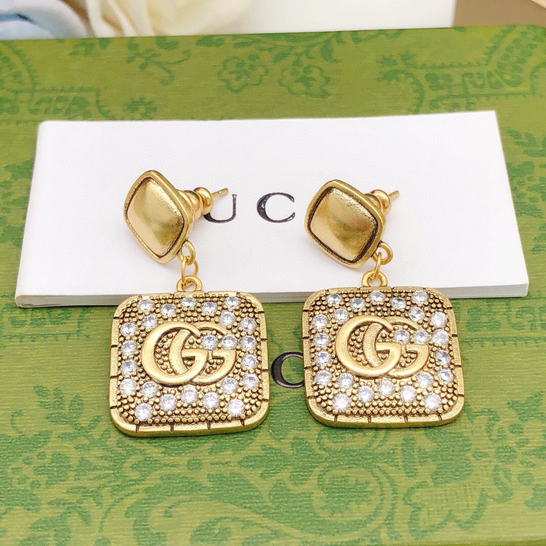 Geometric Emblem Stud Earrings in Polished Metal-Tone – Design 026 front product view