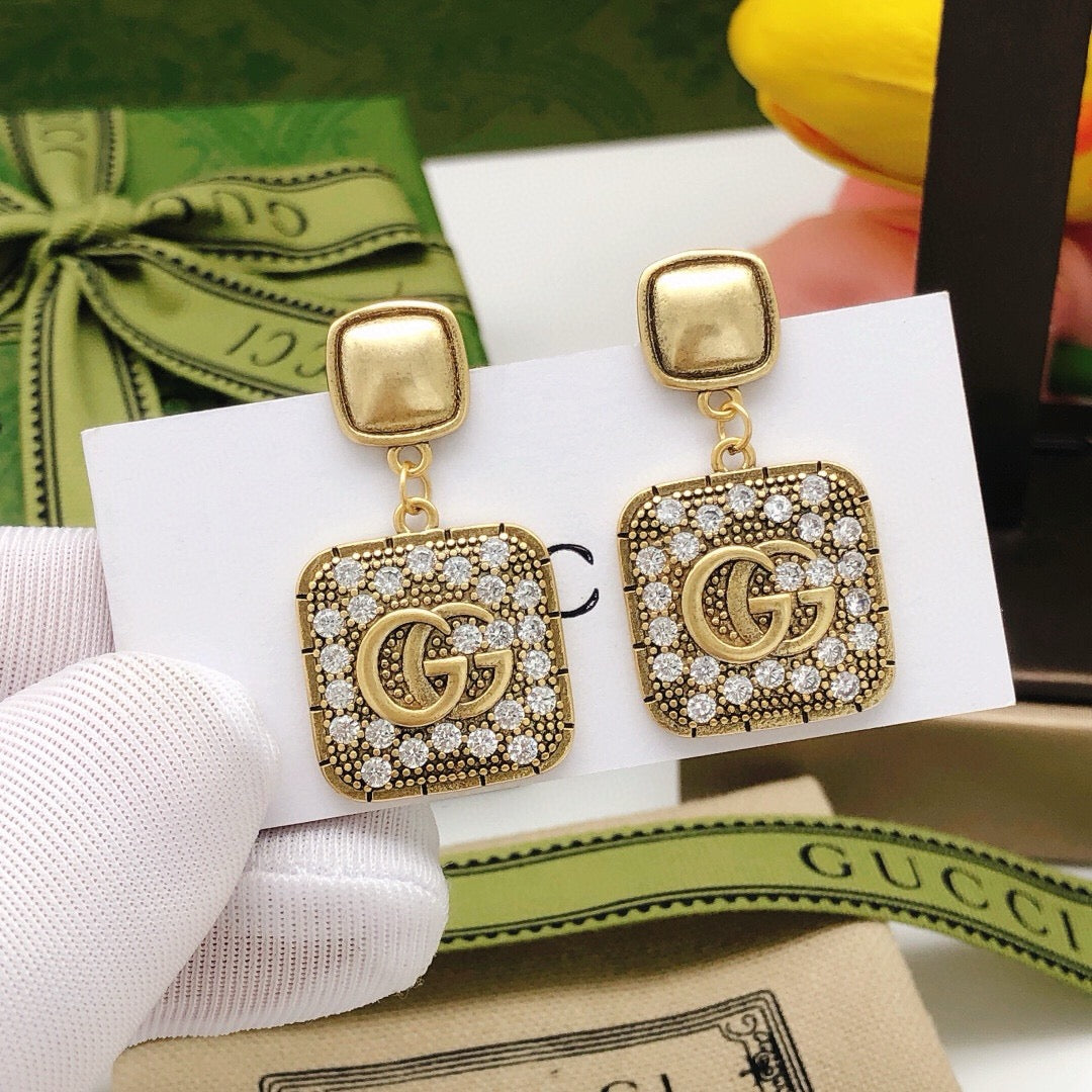 Geometric Emblem Stud Earrings in Polished Metal-Tone – Design 026 front product view