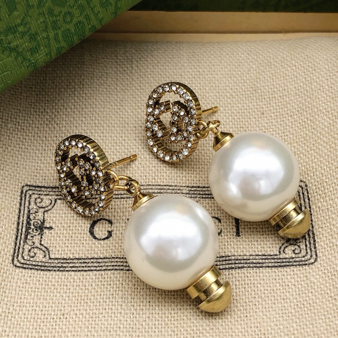 Geometric Emblem Stud Earrings in Polished Metal-Tone – Design 025 front product view