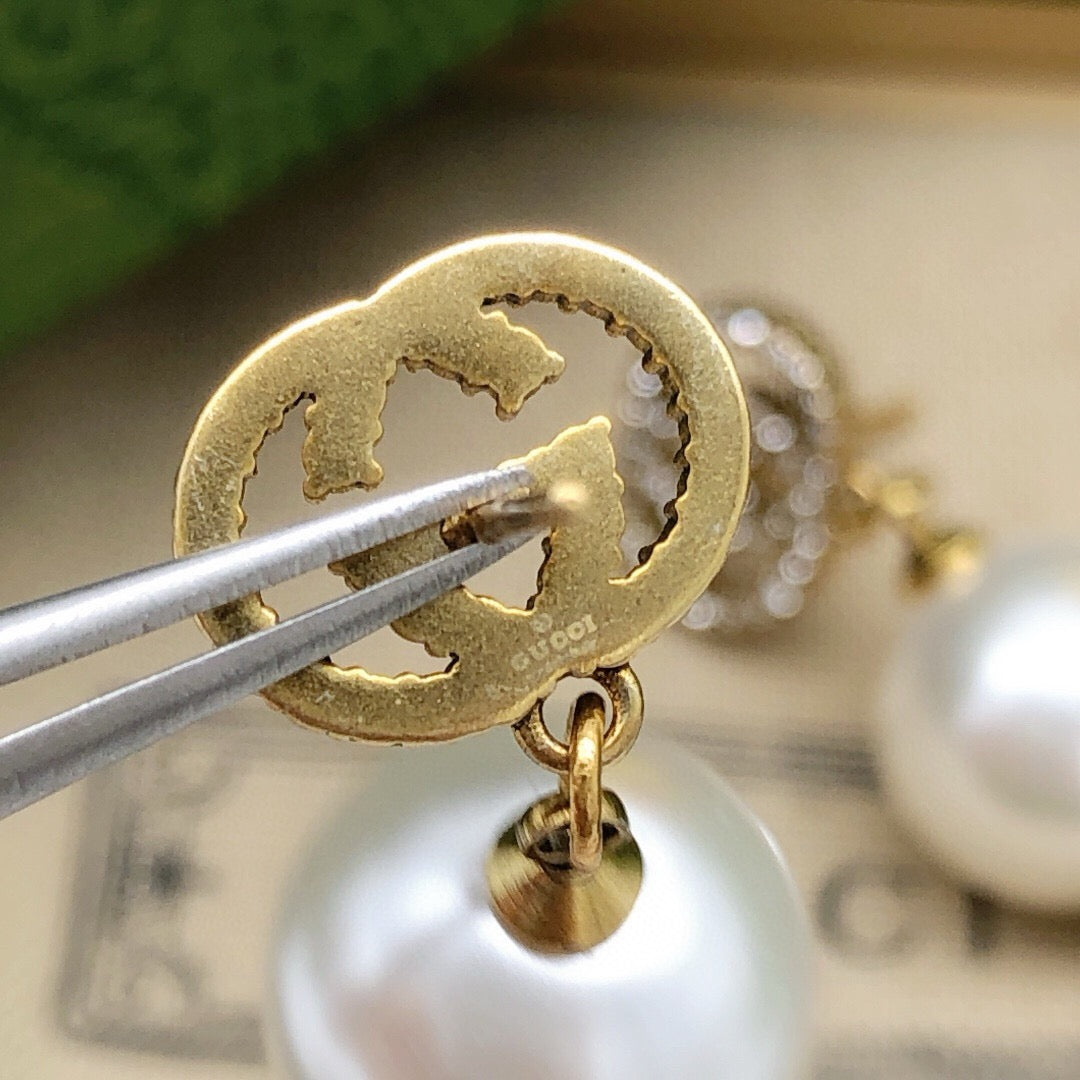Geometric Emblem Stud Earrings in Polished Metal-Tone – Design 025 close-up detail