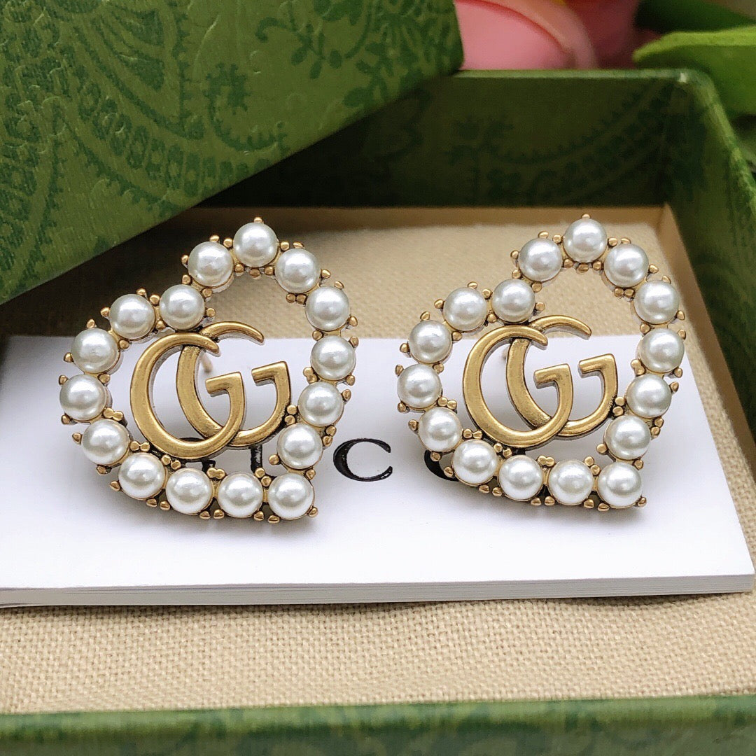 Double-G Emblem Stud Earrings in Polished Metal-Tone – Design 019 front product view