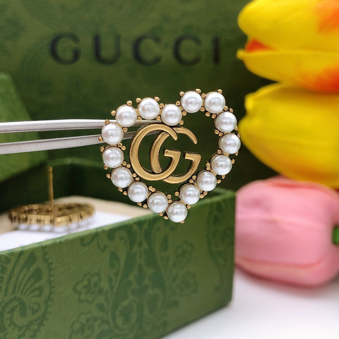 Double-G Emblem Stud Earrings in Polished Metal-Tone – Design 019 styled product view