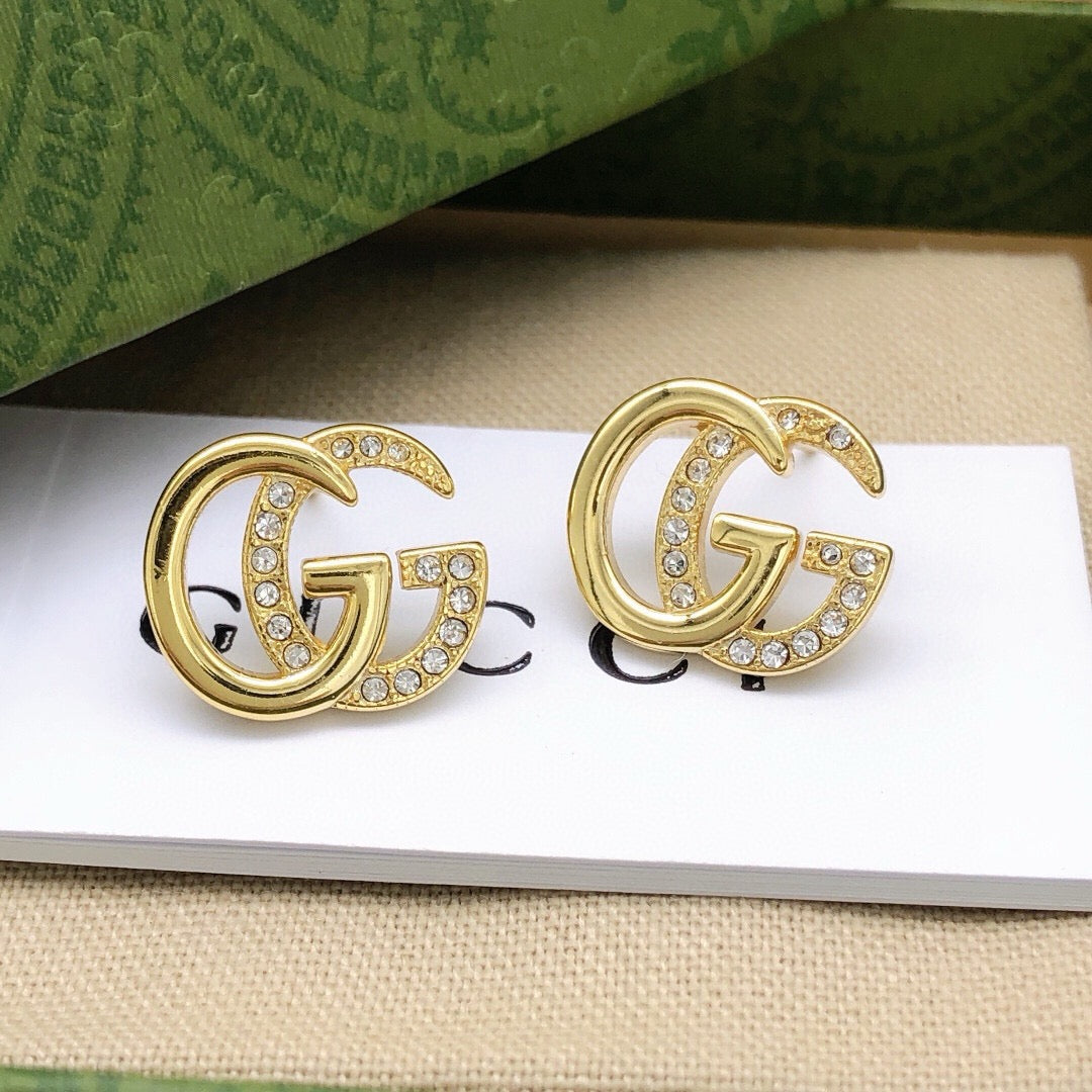 Double-G Emblem Stud Earrings in Polished Metal-Tone – Design 018 styled product view