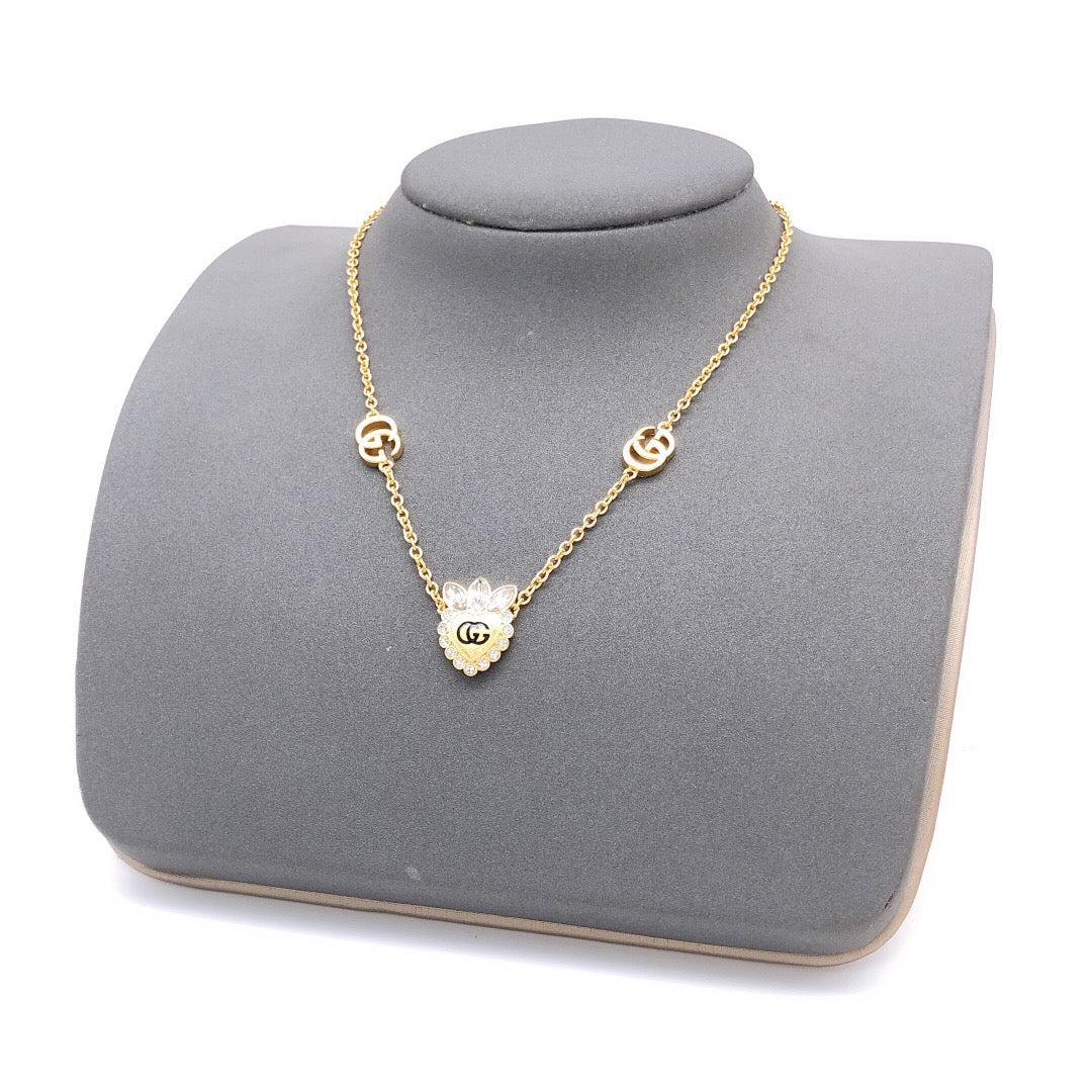 Double-G Emblem Pendant Necklace in Polished Metal-Tone – Crystal Detail – Design 005 styled product view