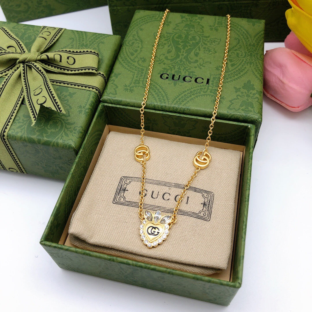 Double-G Emblem Pendant Necklace in Polished Metal-Tone – Crystal Detail – Design 005 detail view