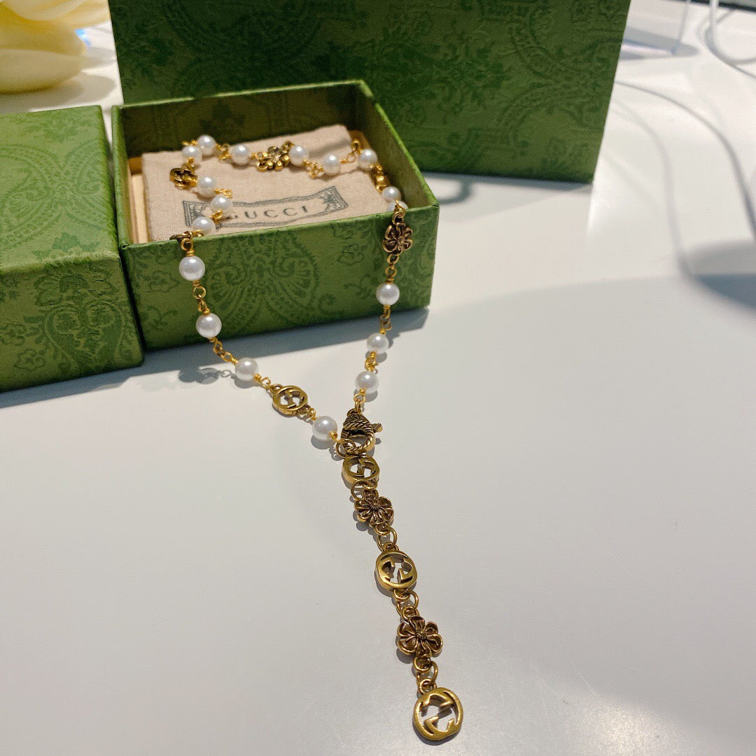 Letter Emblem Pendant Necklace in Polished Metal-Tone – Vintage Detail main product view