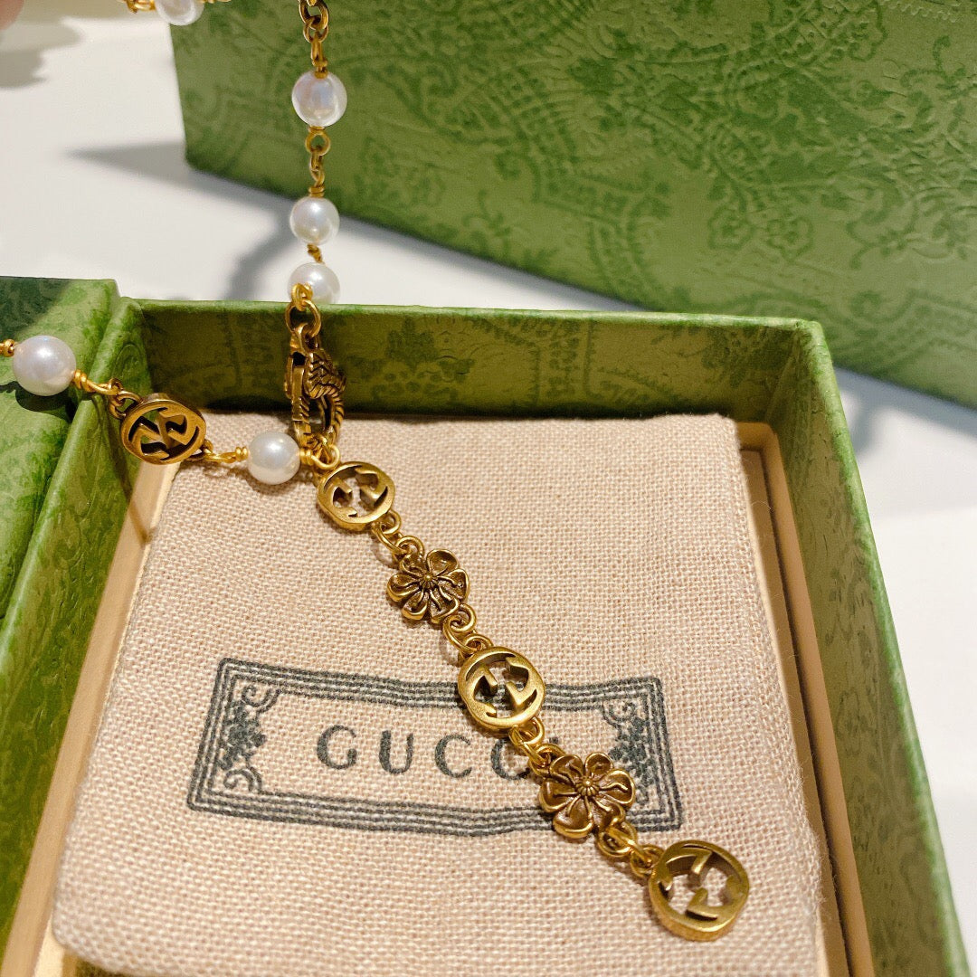 Letter Emblem Pendant Necklace in Polished Metal-Tone – Vintage Detail detail view