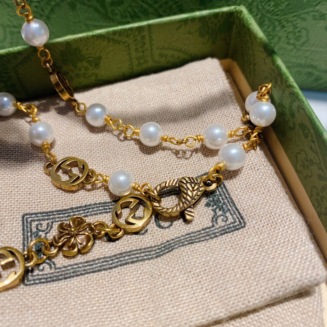 Letter Emblem Pendant Necklace in Polished Metal-Tone – Vintage Detail front product view