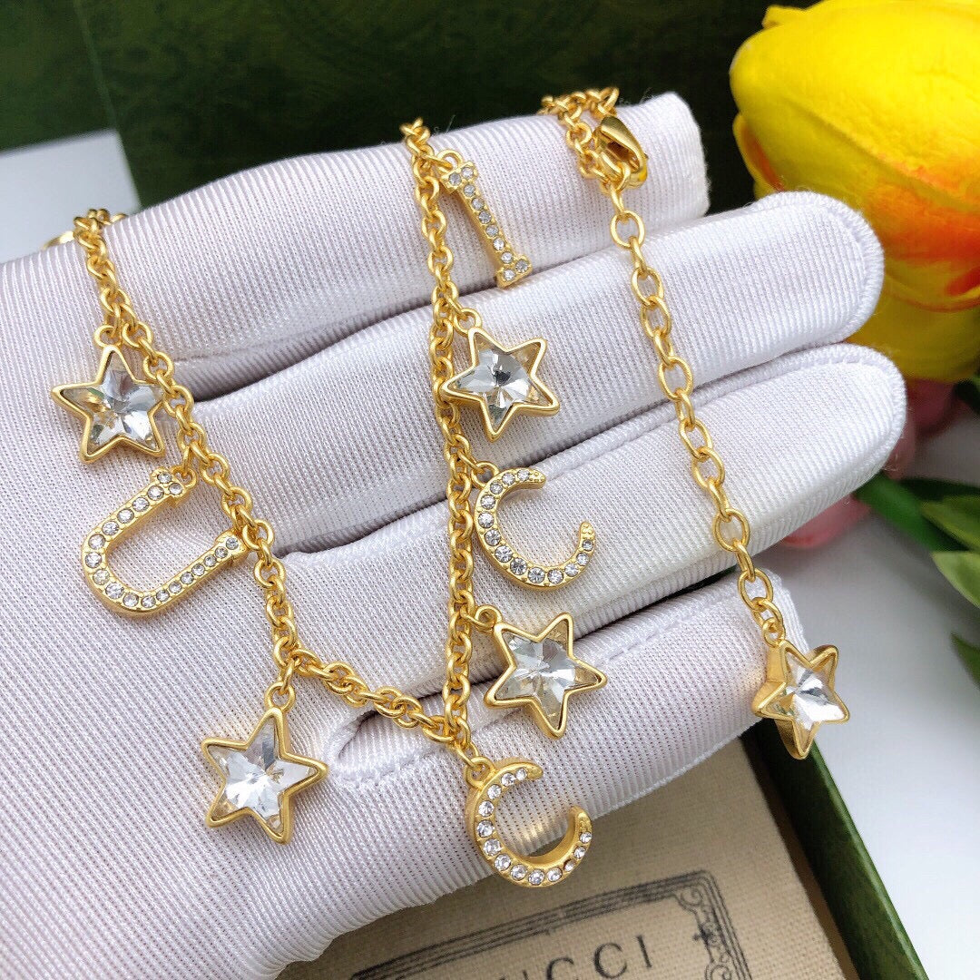Double-G Emblem Pendant Necklace in Polished Metal-Tone – Crystal Detail – Design 004 side detail