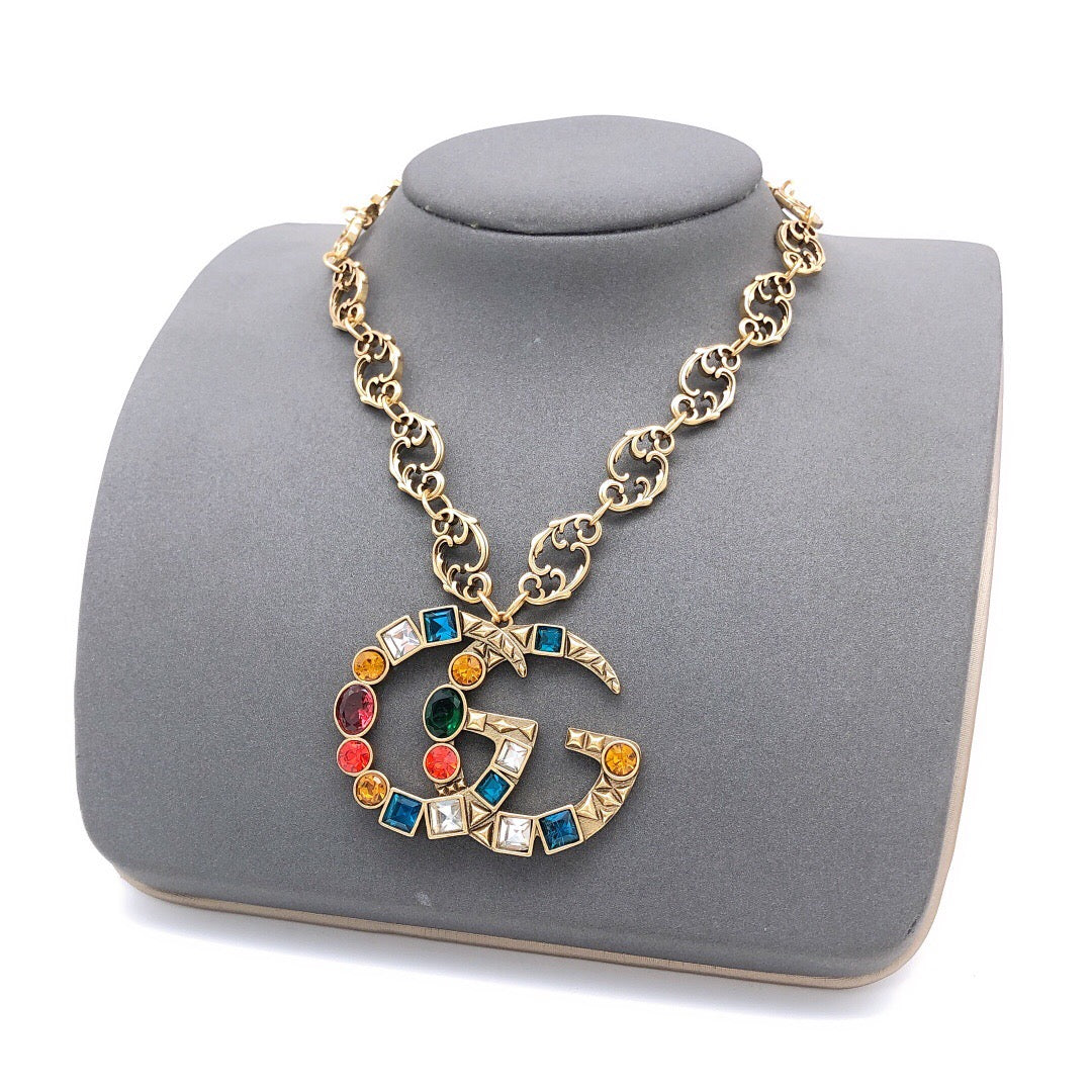 Double-G Emblem Pendant Necklace in Polished Metal-Tone – Crystal Detail – Design 003 styled product view
