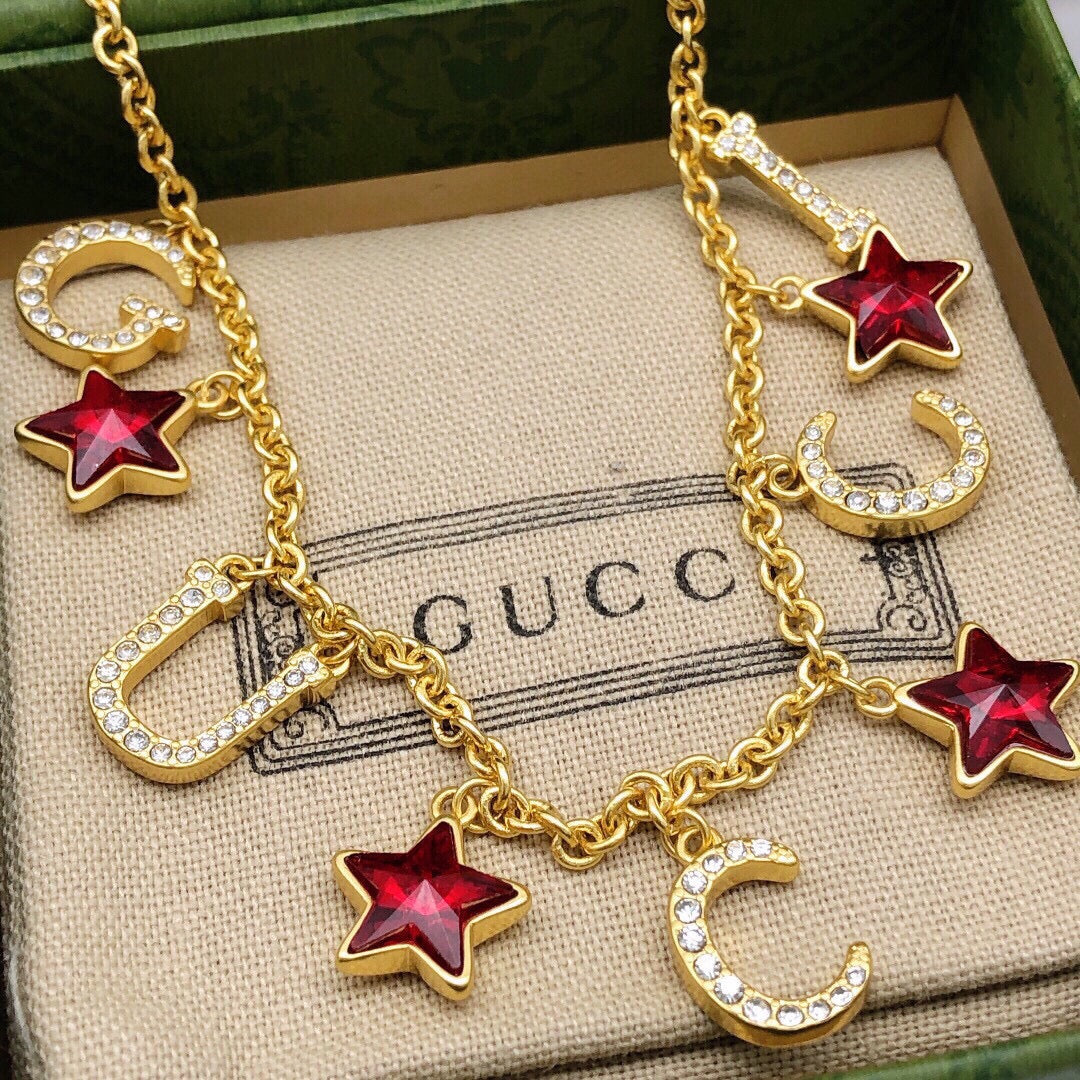 Double-G Emblem Pendant Necklace in Polished Metal-Tone – Red Detail close-up detail